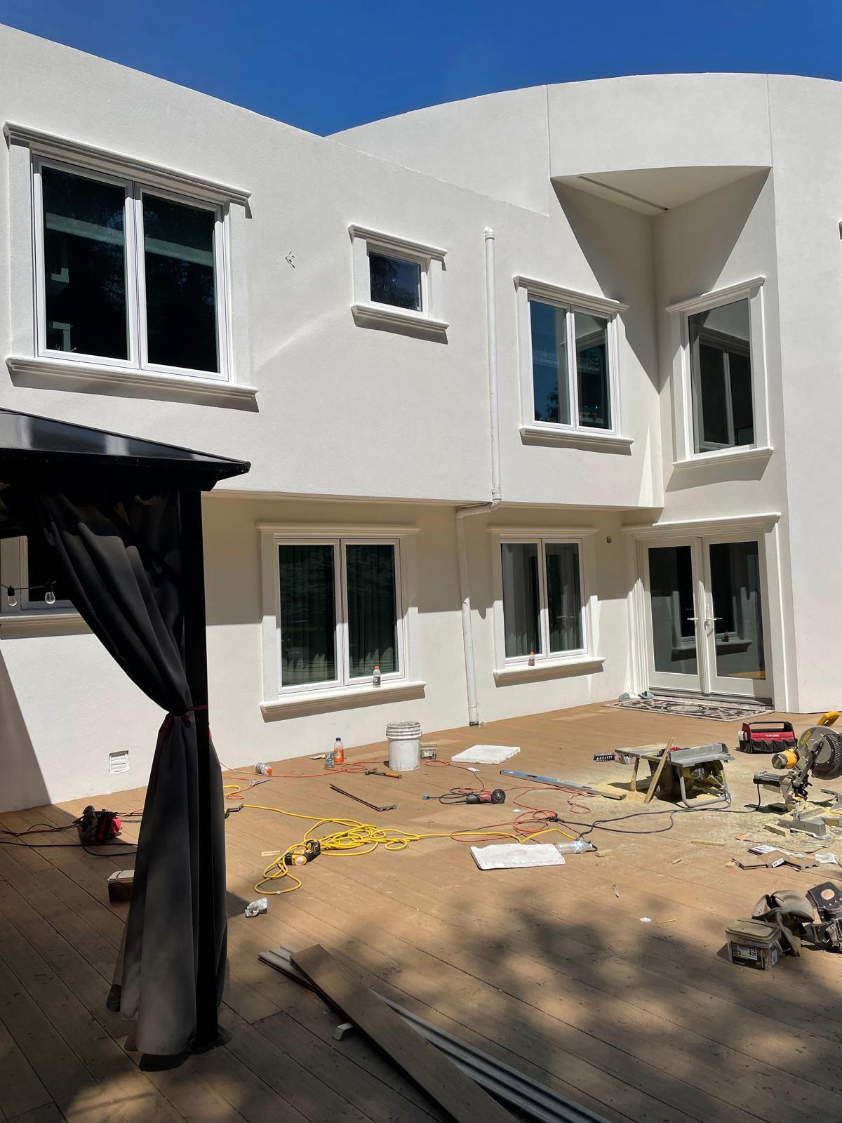 Completed stucco exterior finish on residential property